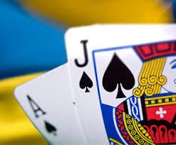 Svensk flagga i bakgrunden och en blackjack i förgrunden